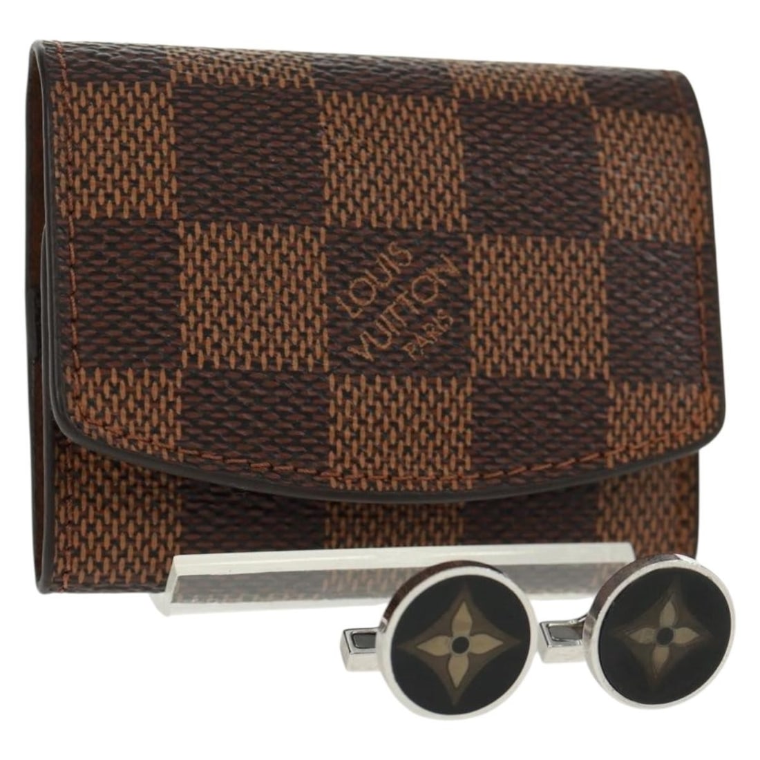 Damier Ebene Canvas Cufflink Case M65055 by Louis Vuitton: Damier Ebene Canvas Cufflink Case M65055 by Louis Vuitton This Louis Vuitton Damier Ebene cuff case features the iconic Damier Ebene canvas in a brown and silver color scheme. Designed for storing cuf