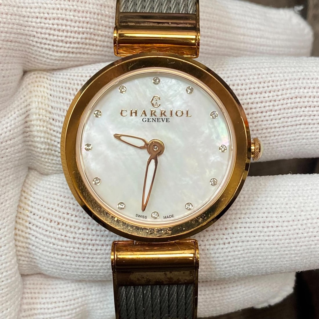 Charriol Forever 32mm Quartz Ladies Watch White MOP Dial FE32.102.005: Charriol Forever 32mm Quartz Ladies Watch White MOP Dial FE32.102.005 This Charriol Forever ladies watch features a sleek 32mm round case crafted from stainless steel, complemented by a stunning white