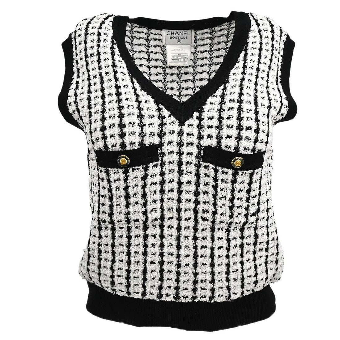 Chanel White Black Sleeveless V-Neck Knit Top 42: Chanel White Black Sleeveless V-Neck Knit Top 42 Elevate your casual wardrobe with this stylish Chanel sleeveless vest sweater top. Crafted from a comfortable knit fabric, it features a flattering V-n