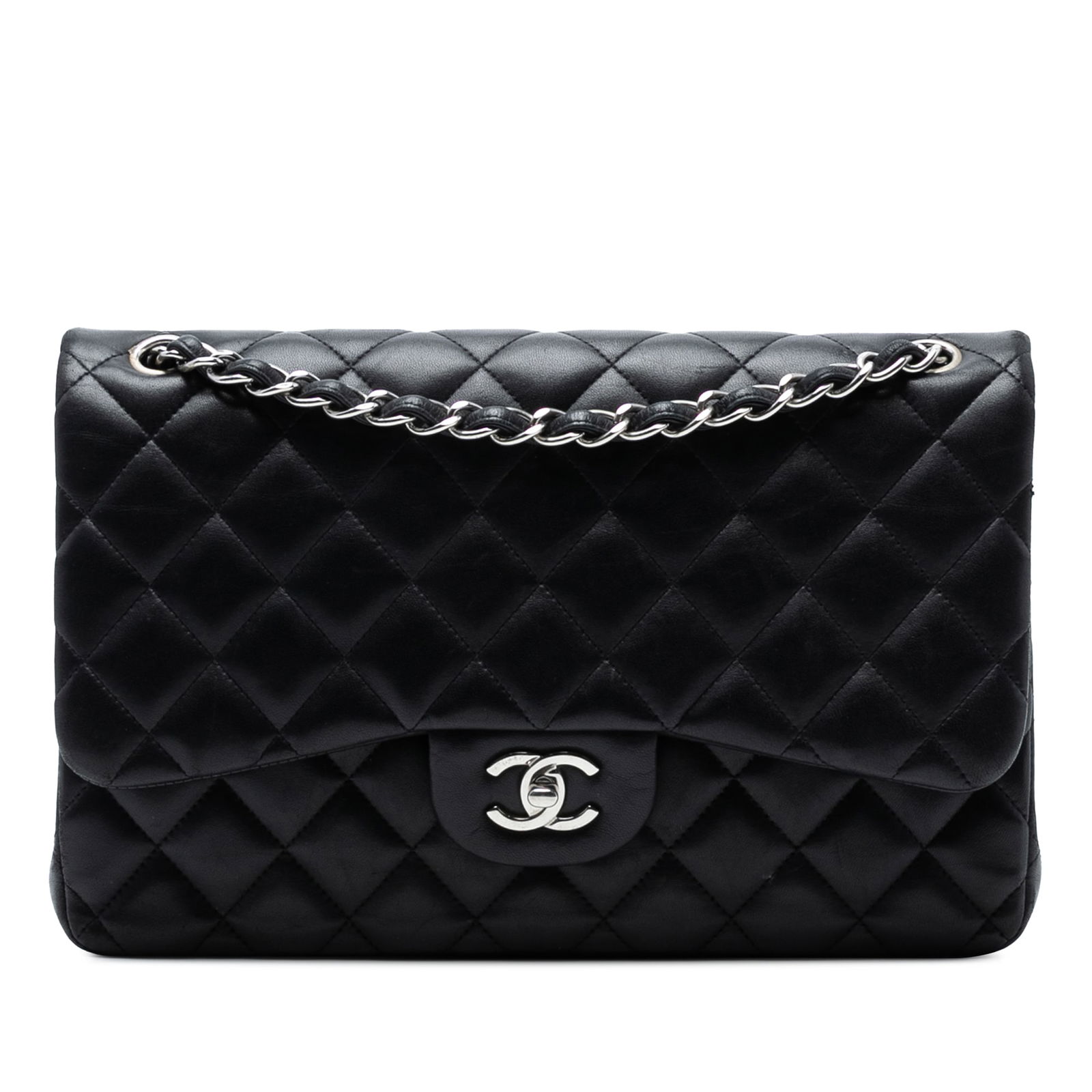 Chanel Jumbo Classic Black Lambskin Double Flap Shoulder Bag: Chanel Jumbo Classic Black Lambskin Double Flap Shoulder Bag This Chanel Jumbo Classic Lambskin Double Flap shoulder bag is a timeless accessory crafted from luxurious quilted lambskin leather. It fea