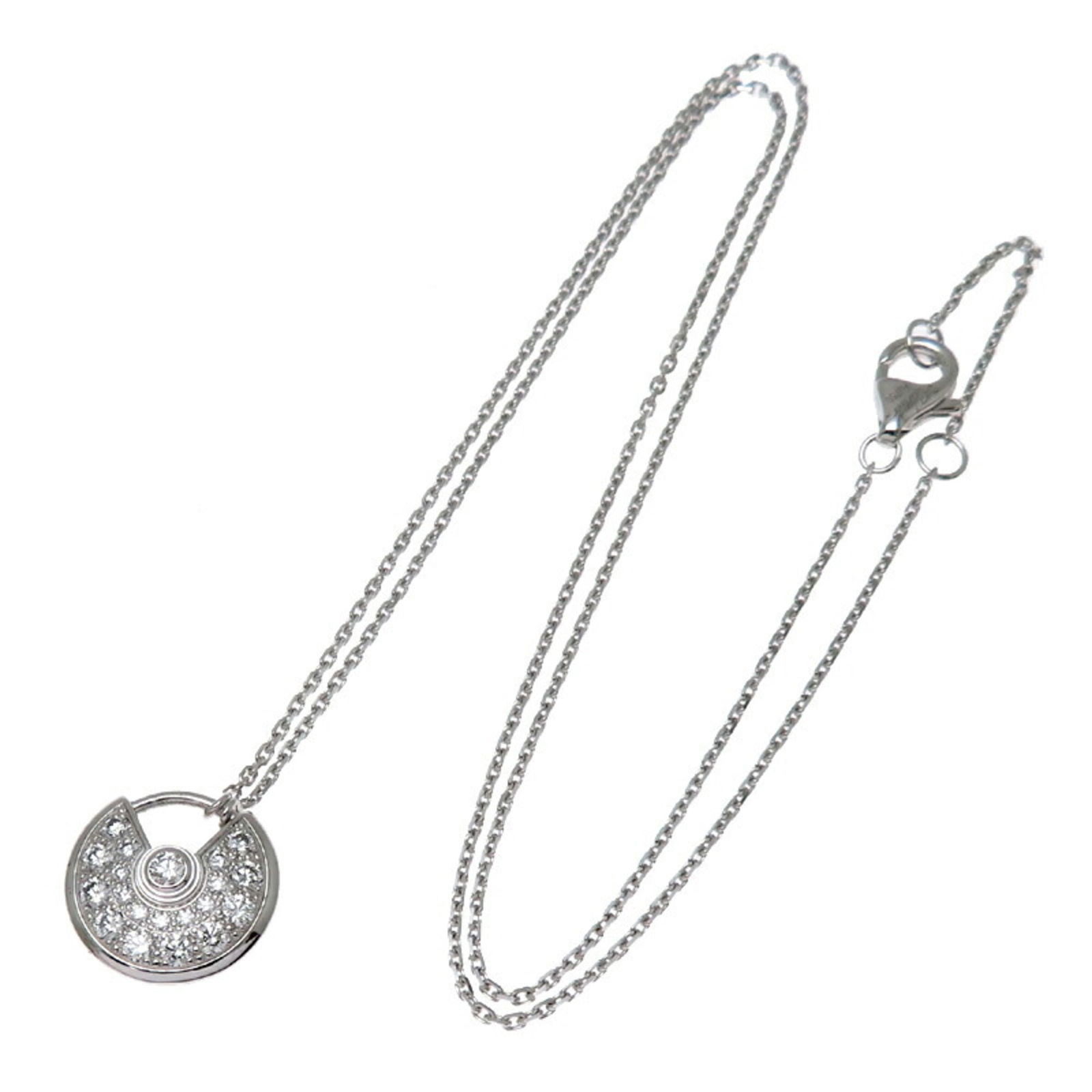 White Gold Cartier Amulette Necklace 11mm x 12mm France: White Gold Cartier Amulette Necklace 11mm x 12mm France This Cartier Amulette pendant features a sleek silver appearance crafted from white gold. Designed for women, it includes a main body with minor