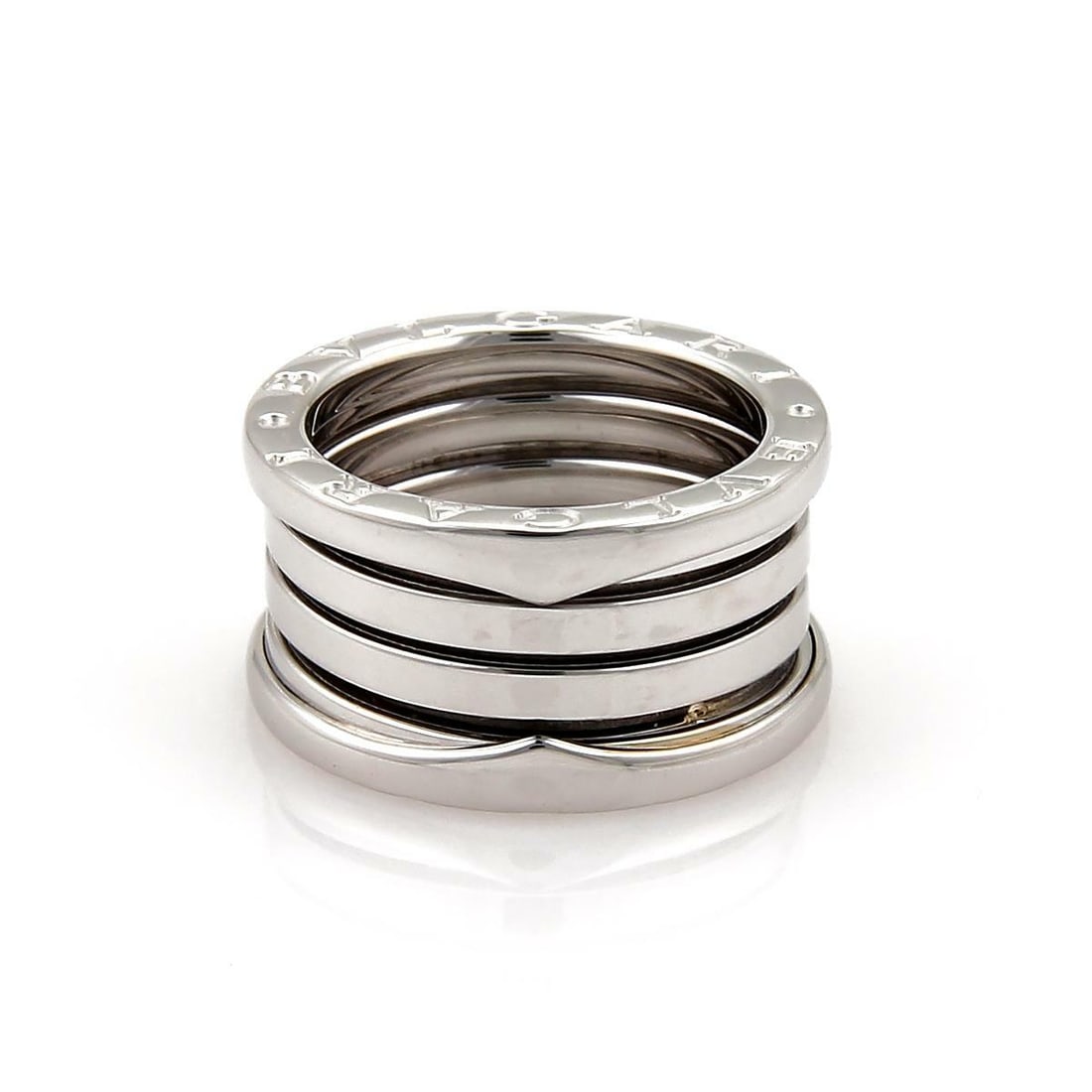 Bvlgari B Zero-1 18k White Gold 10mm Ring Size 51: Bvlgari B Zero-1 18k White Gold 10mm Ring Size 51 Discover the elegance of the Bvlgari B Zero-1 18k White Gold Band Ring, a stunning piece from the iconic collection. This authentic ring features a