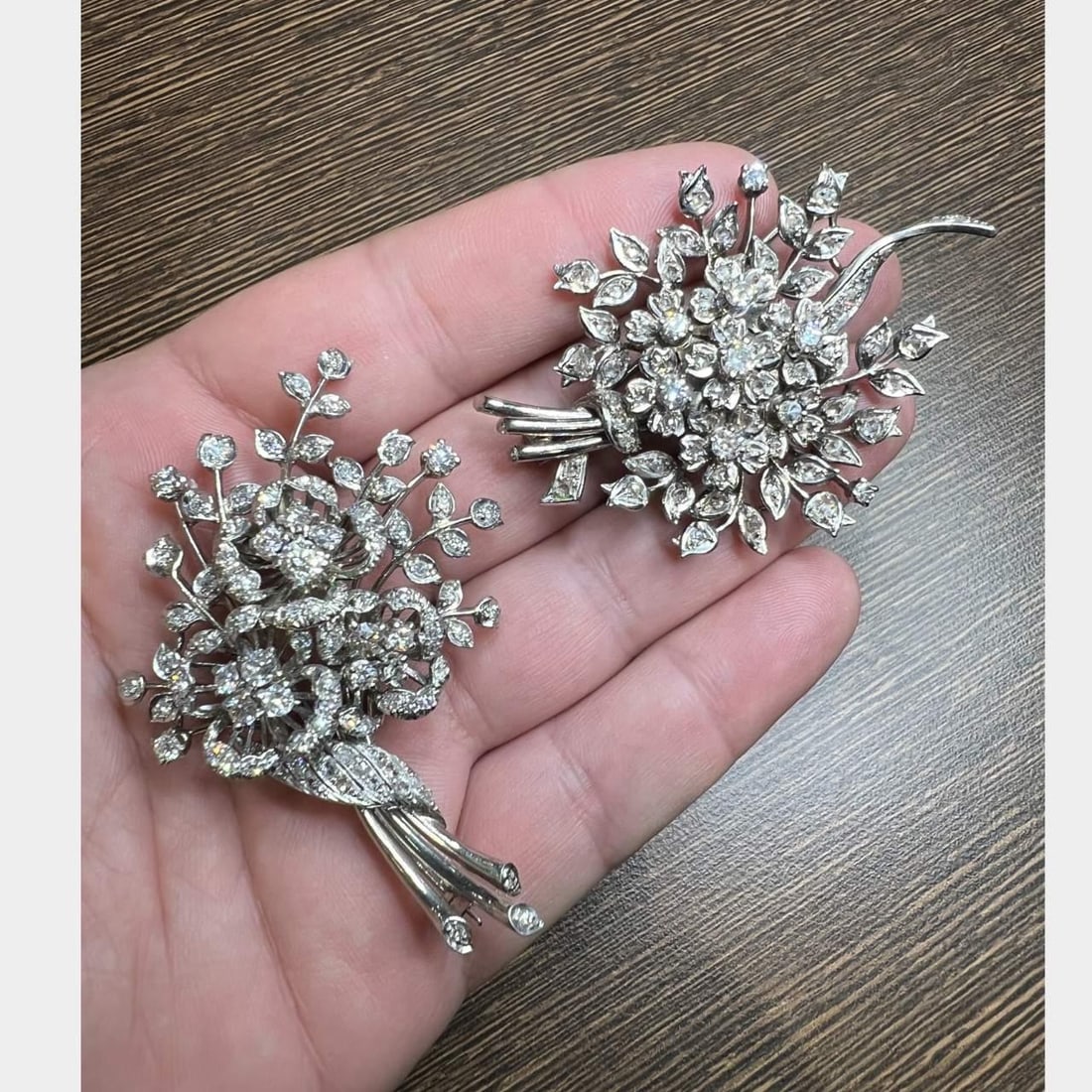 Art Deco 18K White Gold Diamond Clips 10.50 Ct F-H VS1-SI1: Art Deco 18K White Gold Diamond Clips 10.50 Ct F-H VS1-SI1 This exquisite pair of Art Deco clips is crafted from 18K white gold and showcases a stunning array of diamonds totaling approximately 10.50