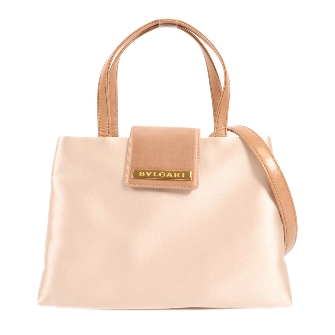 BVLGARI Satin Champagne 2 Way Shoulder Hand Bag Italy: BVLGARI Satin Champagne 2 Way Shoulder Hand Bag Italy This elegant BVLGARI 2 Way Shoulder Bag is the perfect accessory for versatile styling. Crafted in Italy, this handbag features a luxurious satin
