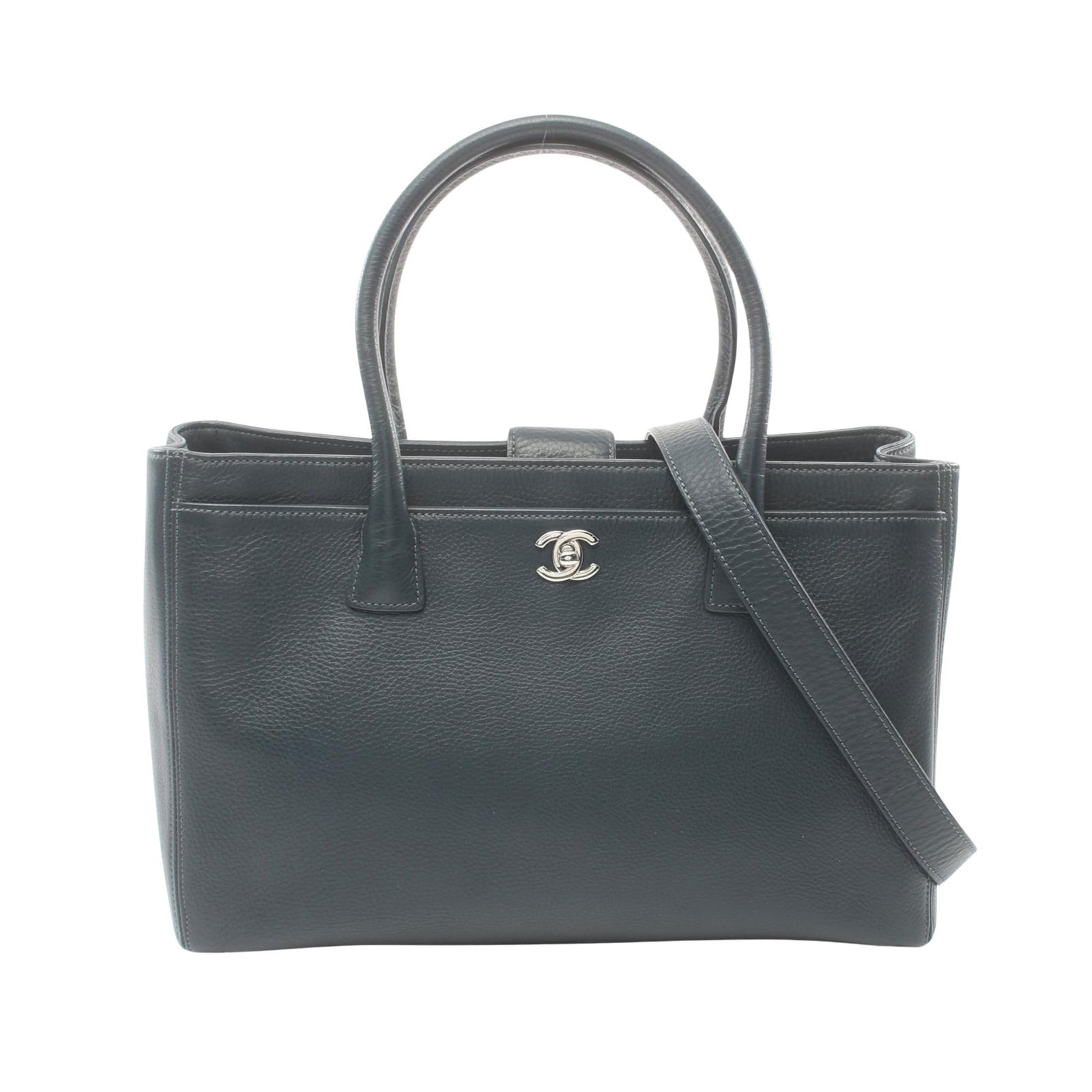 Navy Leather Chanel Executive Tote Bag with Top Handles and Shoulder Strap: Navy Leather Chanel Executive Tote Bag with Top Handles and Shoulder Strap This Chanel Executive handbag features a navy leather exterior and is designed for women. Made in Italy, it offers both a han