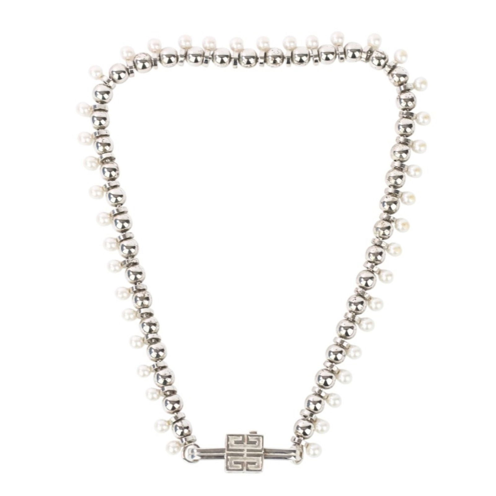 Givenchy G Logo Silver Tone Metal Necklace 47cm Italy: Givenchy G Logo Silver Tone Metal Necklace 47cm Italy This Givenchy G Logo necklace features a sleek silver-tone metal design. It is designed for women and showcases the iconic G logo. The piece is cr