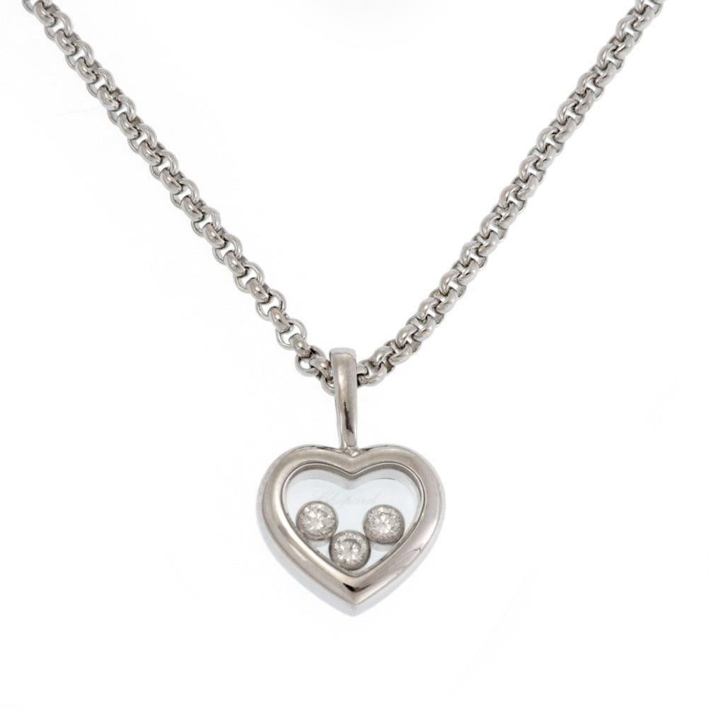 Chopard Happy Diamond 18k White Gold Heart Pendant 3 Diamonds Chain: Chopard Happy Diamond 18k White Gold Heart Pendant 3 Diamonds Chain This exquisite heart pendant and chain from the Chopard Happy Diamond Collection is a true testament to fine craftsmanship. Made fro