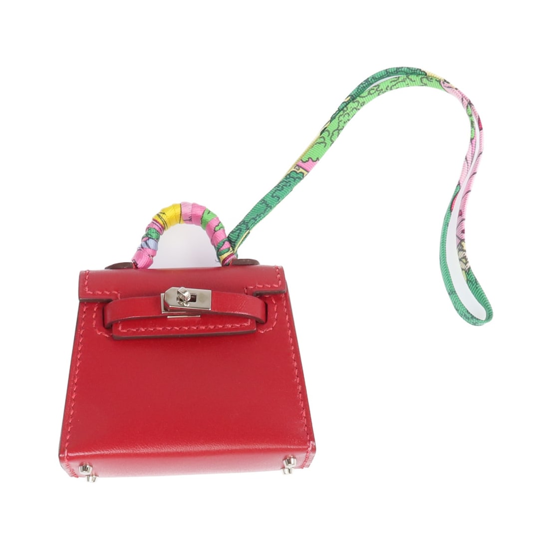 Rouge Vif Tadelakt Leather Kelly Bag Charm by Hermes: Rouge Vif Tadelakt Leather Kelly Bag Charm by Hermes This Hermes Kelly bag charm is crafted from Tadelakt calfskin leather in a vivid red shade. Made in France, it features a classic design and is in
