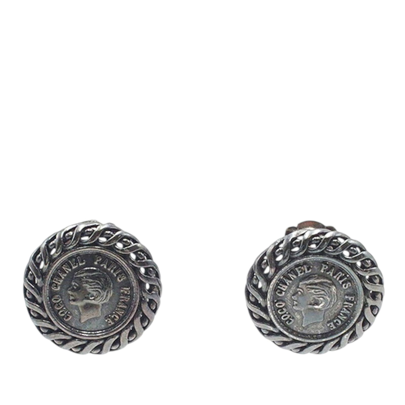 Chanel Medallion Clip Earrings Gunmetal Tone Costume Jewelry: Chanel Medallion Clip Earrings Gunmetal Tone Costume Jewelry These Chanel earrings feature a gunmetal-tone metal body with a medallion design and clip-on closure. Made in France, they belong to the co