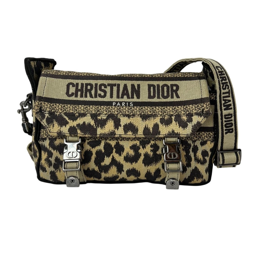 Dior Diorcamp Small Canvas Leopard Animal Print Messenger Bag: Dior Diorcamp Small Canvas Leopard Animal Print Messenger Bag This Christian Dior Small Diorcamp Messenger Shoulder Bag features a striking leopard animal print in brown with multicolor accents. Craft