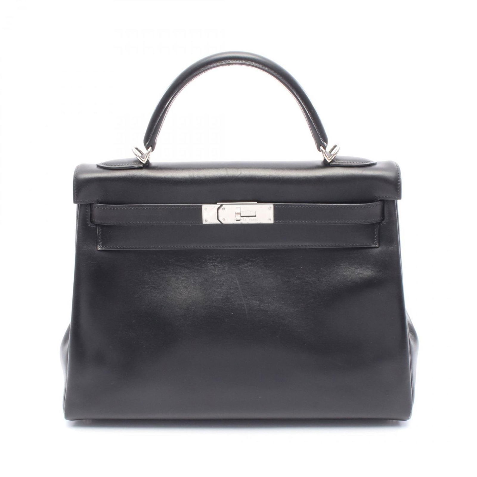 Black Leather Hermes Kelly 32 Handbag with Strap and Handle: Black Leather Hermes Kelly 32 Handbag with Strap and Handle This Hermes Kelly 32 handbag features a classic black leather exterior and is designed for women. The bag includes both a top handle and a d
