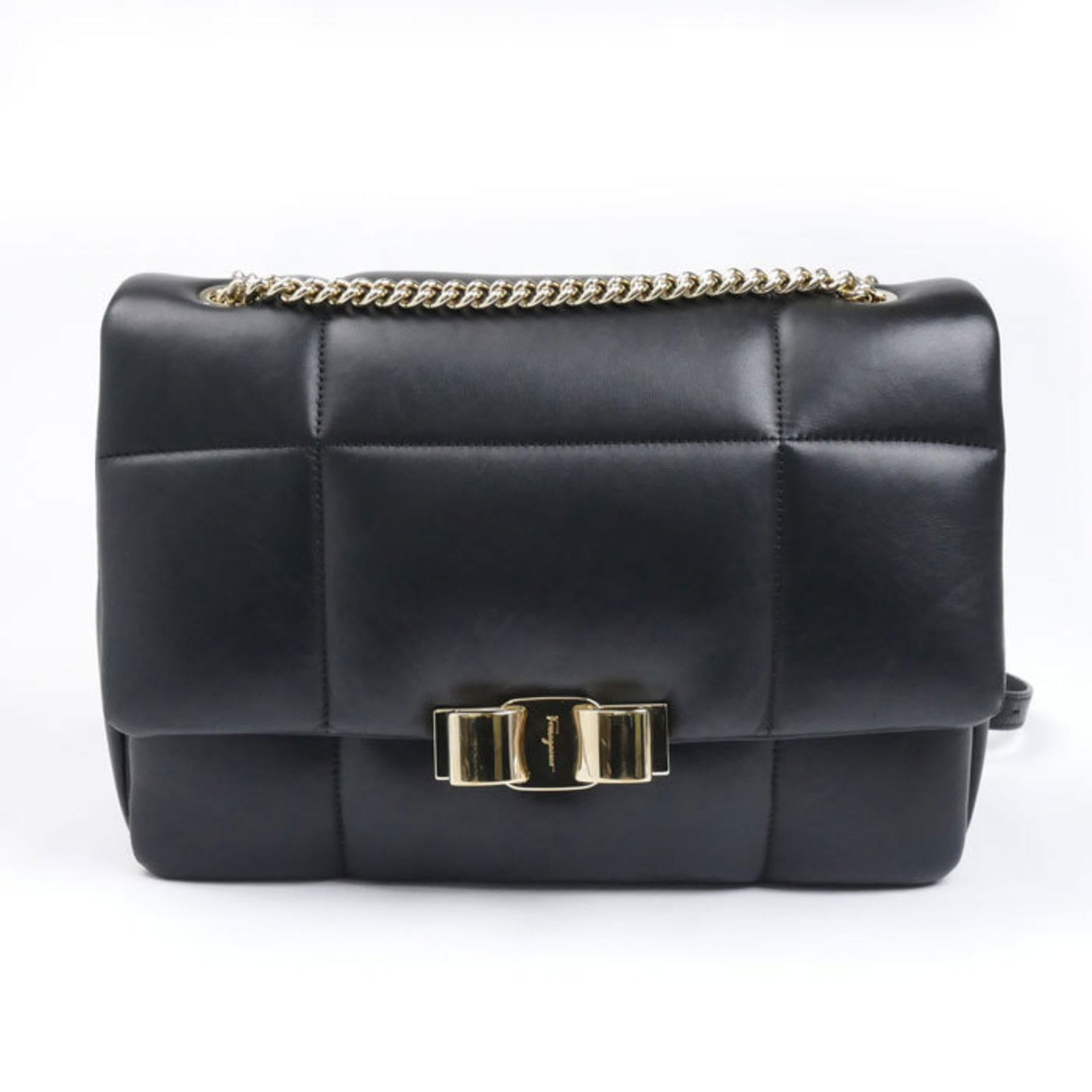 Vara black leather handbag by Salvatore Ferragamo Italy: Vara black leather handbag by Salvatore Ferragamo Italy This Salvatore Ferragamo Vara bag is crafted from black leather and features a classic design. Made in Italy, it includes handles with slight fo