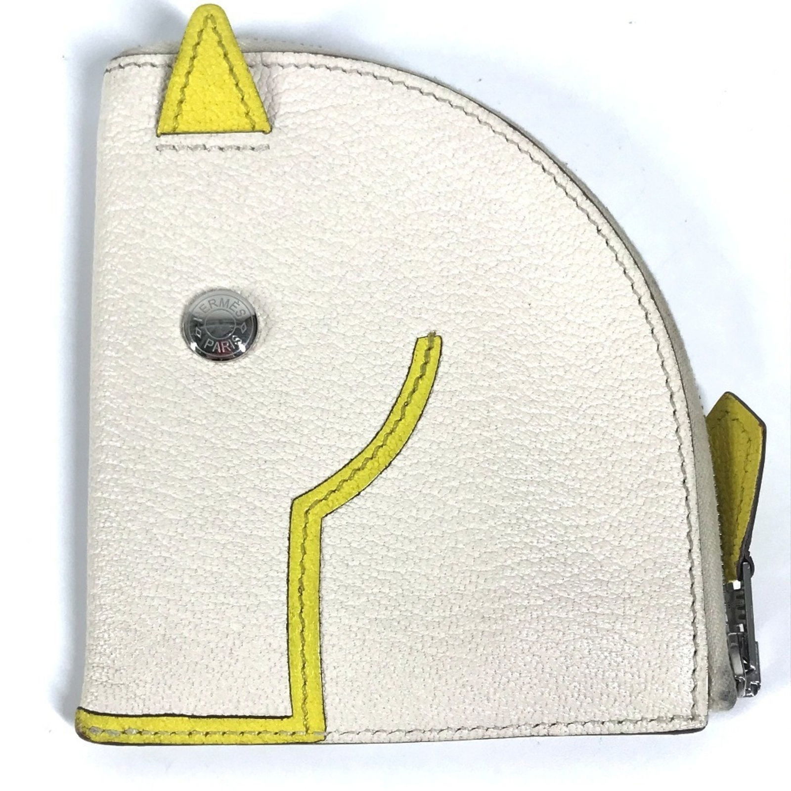 Hermes Paddock White Leather Accessory from France: Hermes Paddock White Leather Accessory from France Hermes Paddock is a compact leather accessory in white, designed for unisex use. It features slight staining on the exterior, minor creasing on the i
