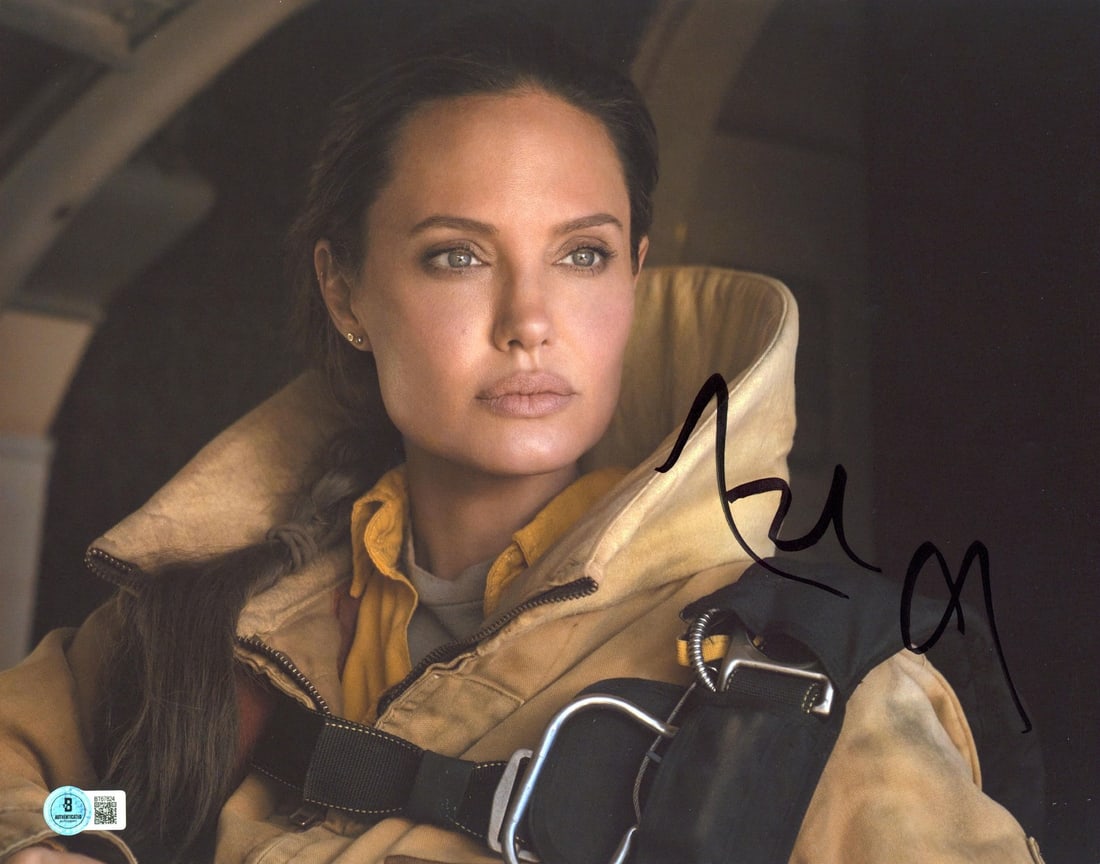 Angelina Jolie Signed Those Who Wish Me Dead 11x14 Photo BAS Authenticated: Angelina Jolie Signed Those Who Wish Me Dead 11x14 Photo BAS Authenticated This is an original 11x14 photograph personally signed by Angelina Jolie, featuring her role in "Those Who Wish Me Dead." The