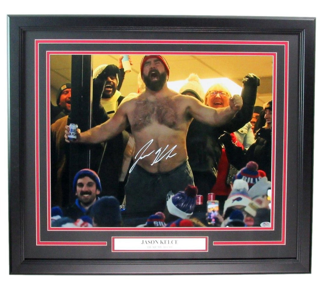 Jason Kelce Autographed 16x20 Framed Photo Eagles PSA/DNA: Jason Kelce Autographed 16x20 Framed Photo Eagles PSA/DNA This striking 16x20 photo features Jason Kelce, showcased in a dynamic pose without a shirt, and is beautifully framed. The piece is authentic