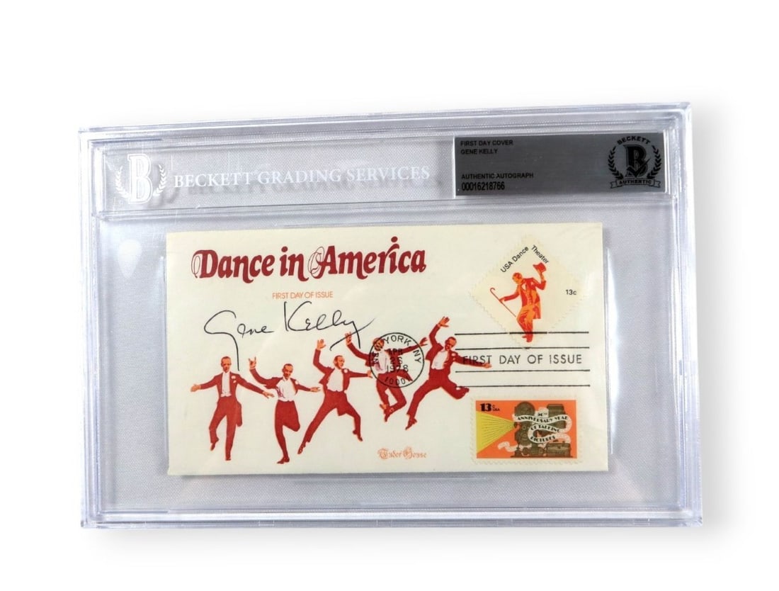 Gene Kelly Signed First Day Cover Autographed JSA 6 x 9: Gene Kelly Signed First Day Cover Autographed JSA 6 x 9 This Gene Kelly autographed First Day Cover is a unique collectible that celebrates the legendary dancer and singer. The item is authenticated b