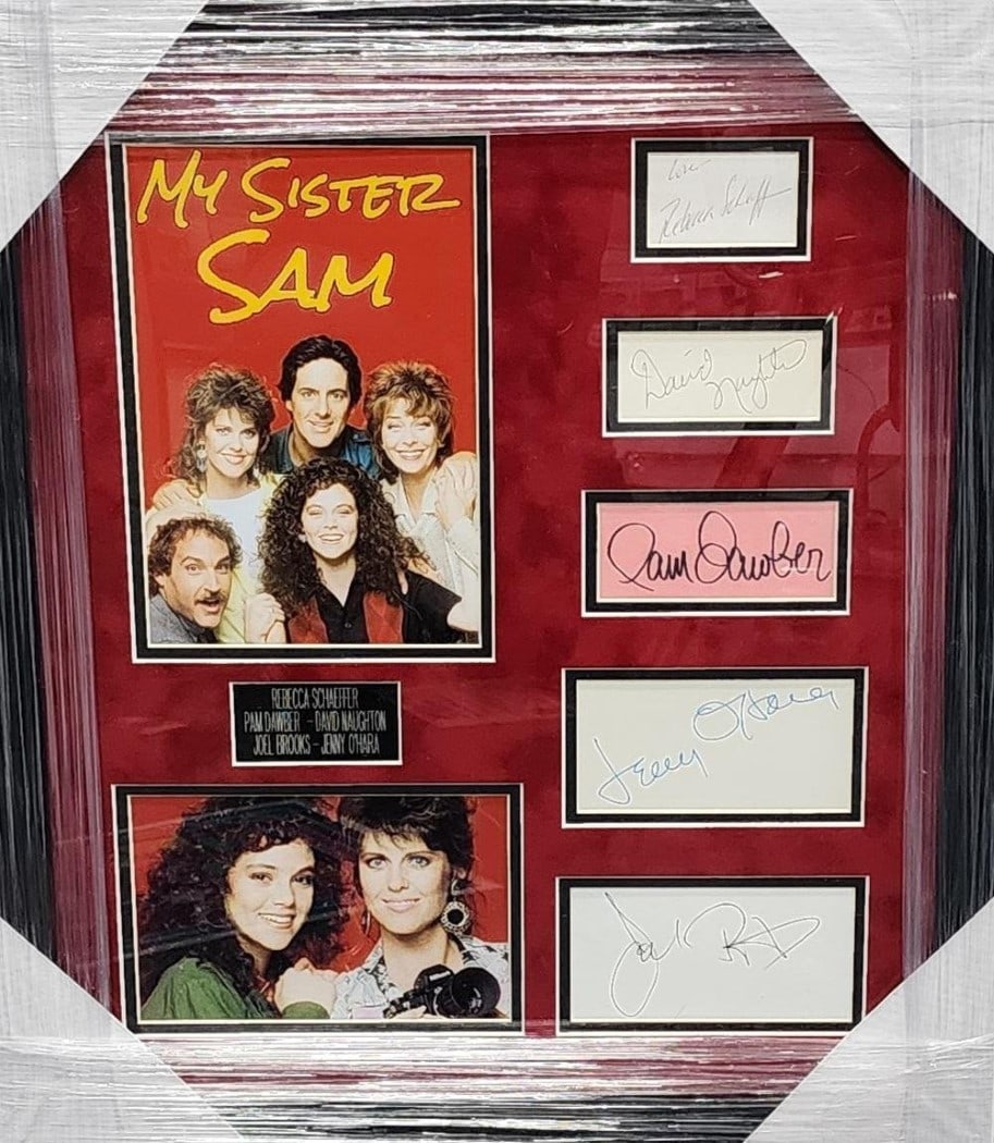 My Sister Sam Signed Cast Cuts Framed 19x22 JSA Authenticated: My Sister Sam Signed Cast Cuts Framed 19x22 JSA Authenticated This framed collectible features autographed cuts from the cast of the television series 'My Sister Sam', including signatures from Rebecc