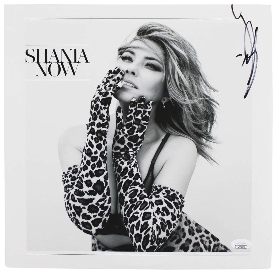 Shania Twain Signed Now Album Cover JSA Certified Authentic: Shania Twain Signed Now Album Cover JSA Certified Authentic This is an authentic signed album cover of Shania Twain's album "Now". The cover has been personally signed by Shania Twain and comes with a