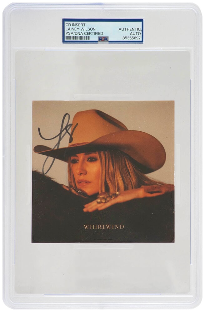 Lainey Wilson Signed Whirlwind 5x5 CD Cover PSA/DNA Encapsulated: Lainey Wilson Signed Whirlwind 5x5 CD Cover PSA/DNA Encapsulated This is a Lainey Wilson signed 'Whirlwind' 5x5 CD cover, authenticated and encapsulated by PSA/DNA. The encapsulated item measures 6.5x