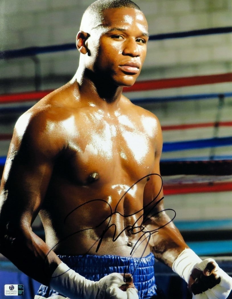 Floyd Mayweather Jr Autographed 11X14 Photo GAI Authenticated Boxing Champion: Floyd Mayweather Jr Autographed 11X14 Photo GAI Authenticated Boxing Champion Relive the glory of boxing with this stunning autographed 11X14 photo of Floyd Mayweather Jr. showcasing his iconic 'sexy