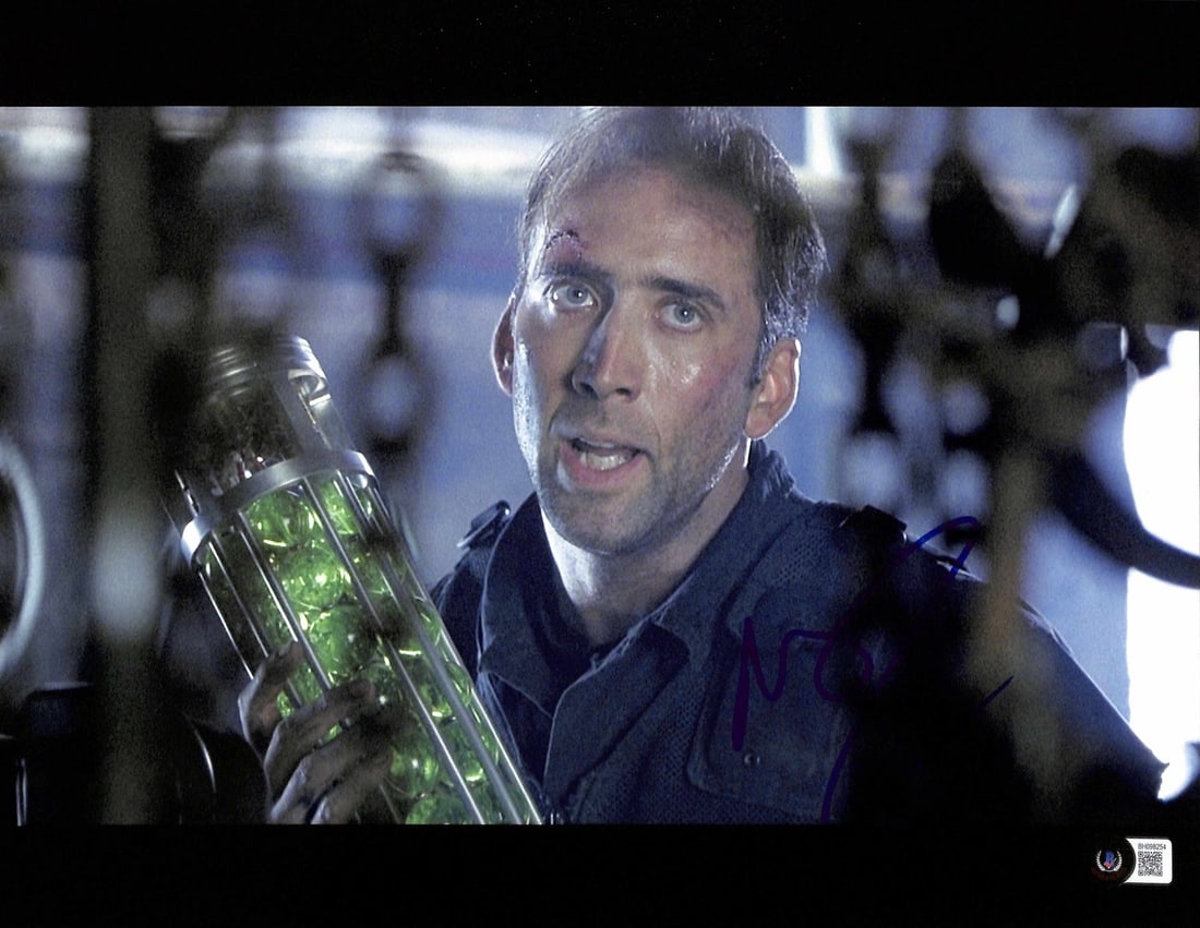 Nicolas Cage Signed 11x14 Photo The Rock Beckett Certified: Nicolas Cage Signed 11x14 Photo The Rock Beckett Certified This stunning 11x14 color photograph features a signature from actor Nicolas Cage, captured during his role in the iconic film 'The Rock'. Th