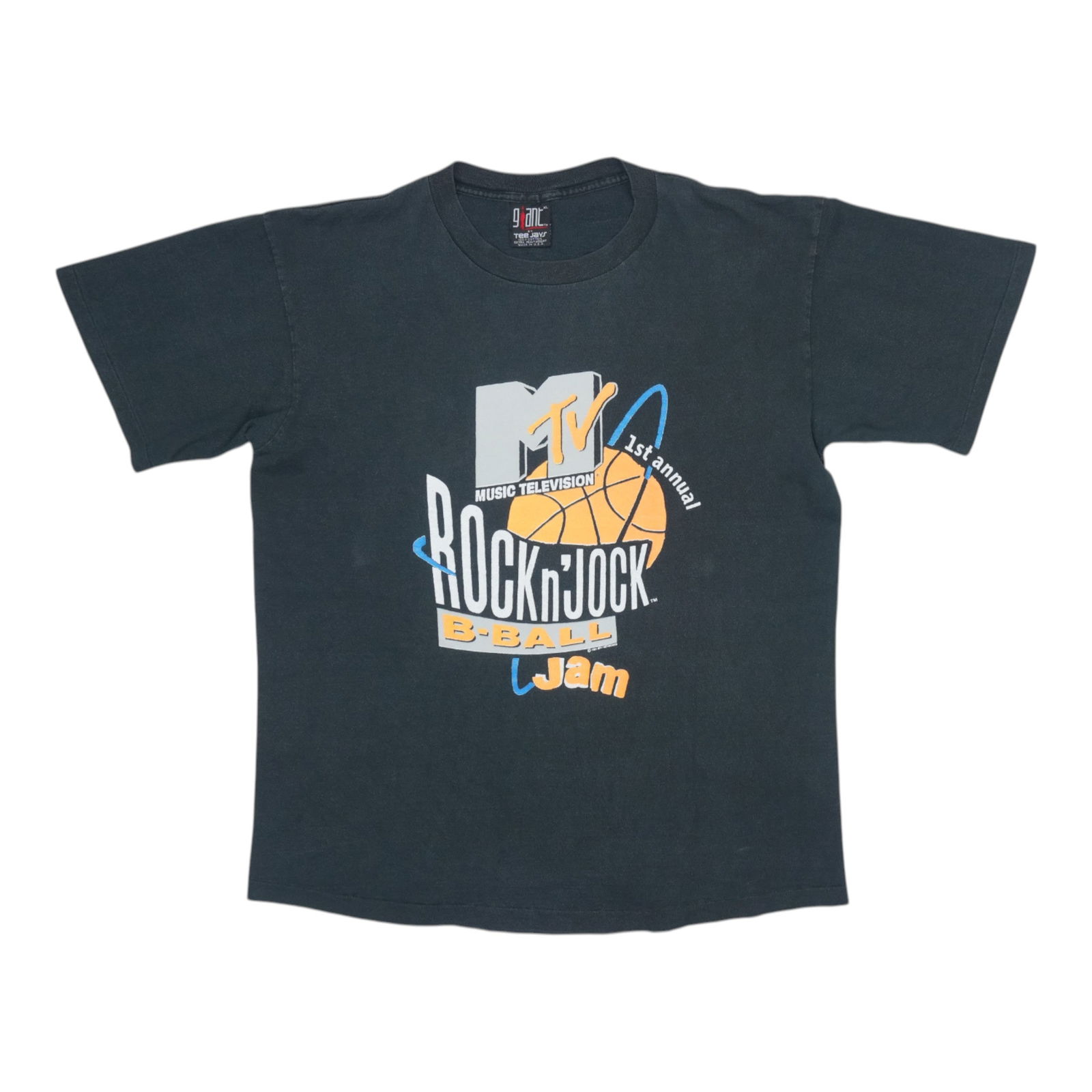 Vintage 1991 Basketball Tee Featuring MTV Rock N Jock Event Graphics: Vintage 1991 Basketball Tee Featuring MTV Rock N Jock Event Graphics This is an original vintage 1991 MTV Rock N Jock Basketball Shirt featuring front and back graphics. Made from 100% cotton, the shi