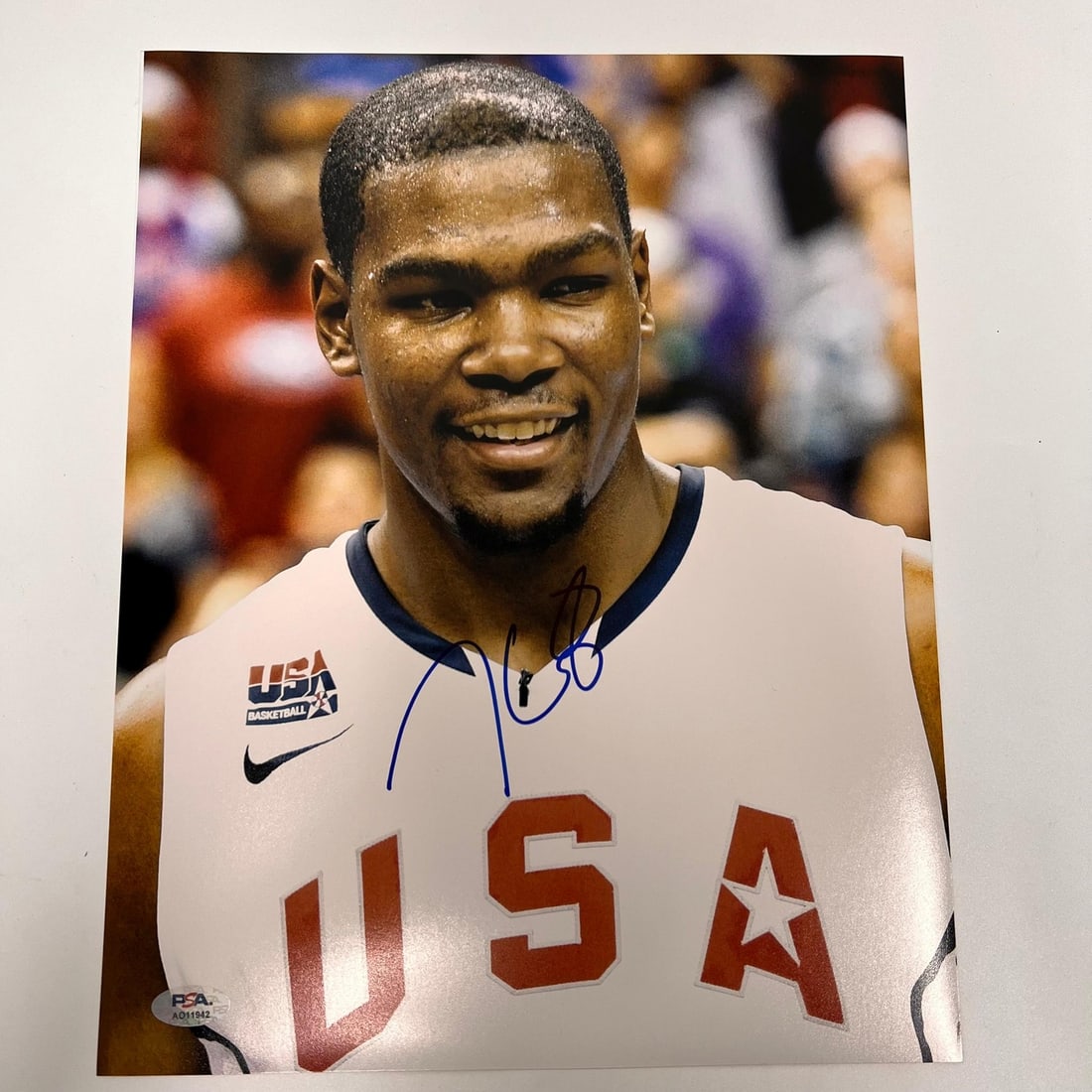 Kevin Durant Autographed 11x14 Photo PSA/DNA Authentic USA Basketball: Kevin Durant Autographed 11x14 Photo PSA/DNA Authentic USA Basketball This is an original 11x14 photograph of Kevin Durant, featuring his autograph. The photo showcases Durant during his time with the