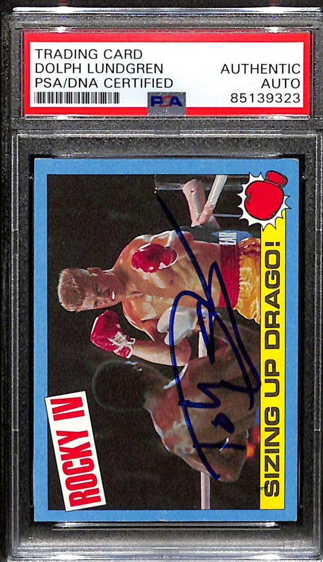 Dolph Lundgren Signed 1985 TOPPS Rocky IV Drago Card PSA/DNA #17: Dolph Lundgren Signed 1985 TOPPS Rocky IV Drago Card PSA/DNA #17 Offered is an original 1985 TOPPS Rocky IV trading card featuring Dolph Lundgren as Ivan Drago, which has been signed by the actor. Thi