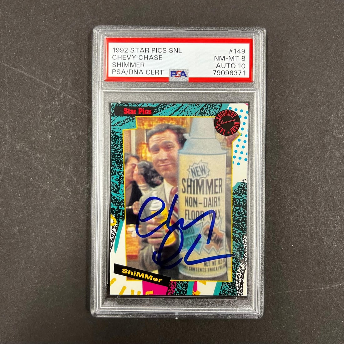 Chevy Chase Autographed 1992 Star Pics Shimmer #149 Card PSA 8 Auto 10: Chevy Chase Autographed 1992 Star Pics Shimmer #149 Card PSA 8 Auto 10 This is a 1992 Star Pics Shimmer #149 trading card featuring the iconic Chevy Chase, signed by the actor himself. Authenticated b
