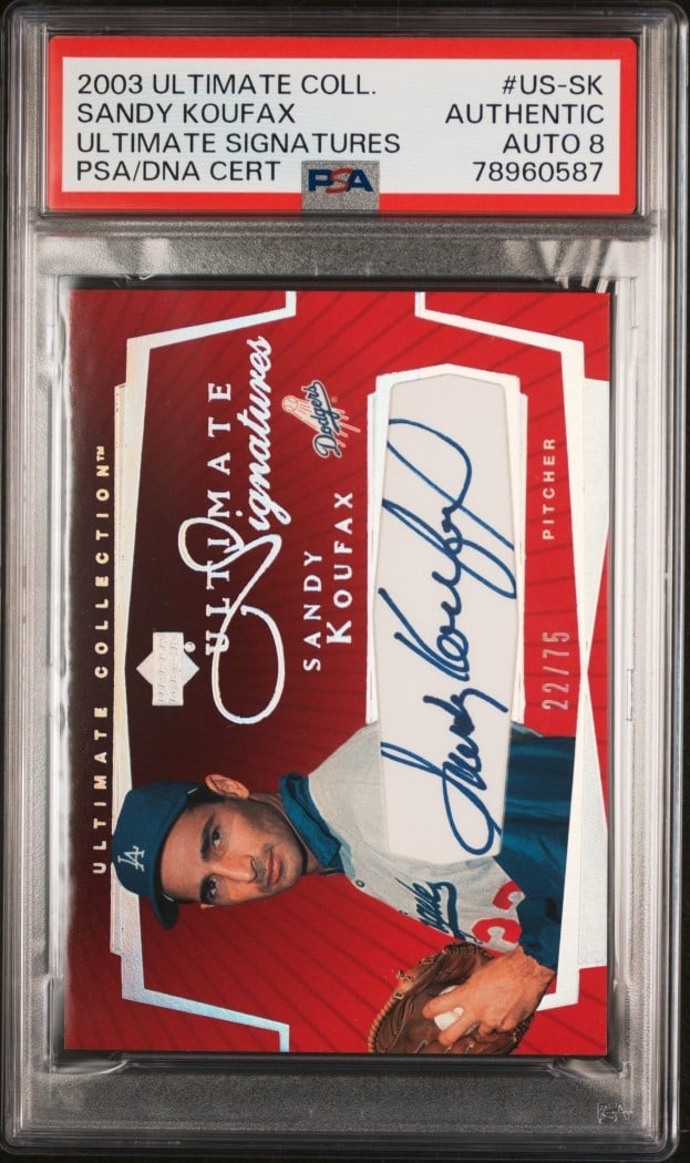 Sandy Koufax 2003 Ultimate Collection PSA 8 Signature Baseball Card #US-SK: Sandy Koufax 2003 Ultimate Collection PSA 8 Signature Baseball Card #US-SK This collectible features a Sandy Koufax 2003 Ultimate Collection Signature baseball card, graded PSA 8. It showcases the leg