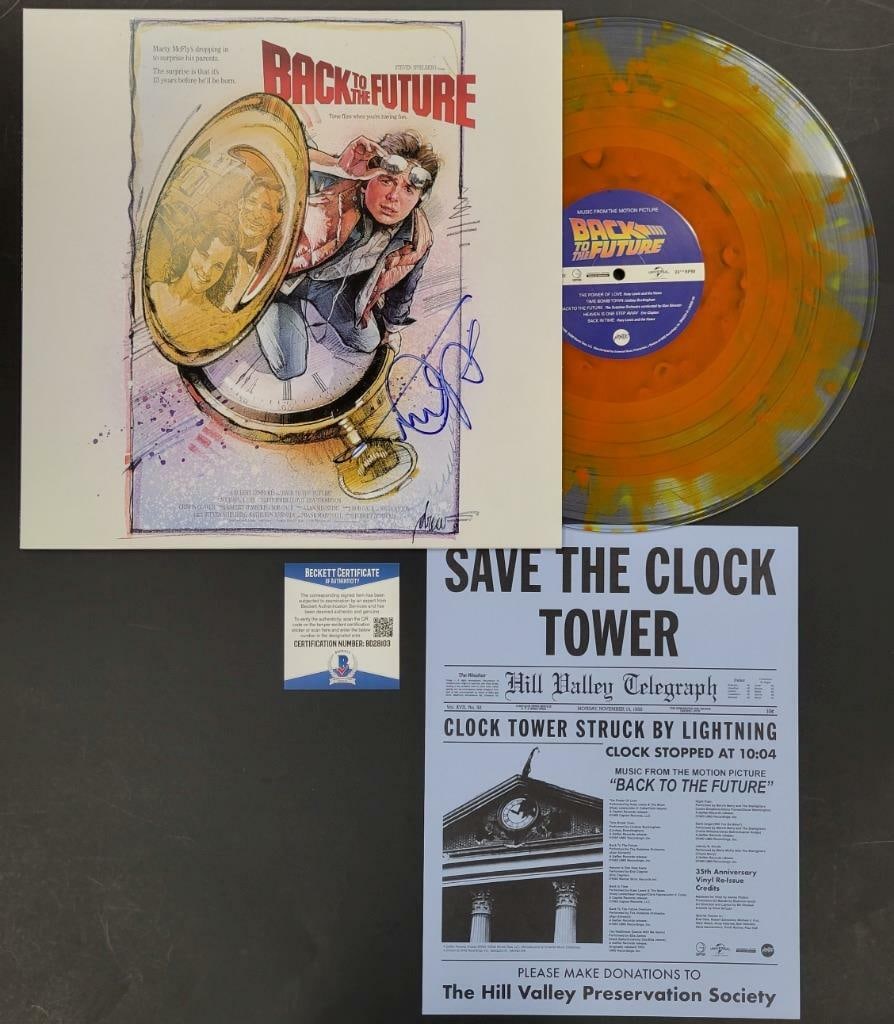 Michael J Fox Signed Back to the Future Vinyl Record Beckett Authenticated: Michael J Fox Signed Back to the Future Vinyl Record Beckett Authenticated This collectible vinyl record features the iconic soundtrack from the classic movie 'Back to the Future,' signed by the belov