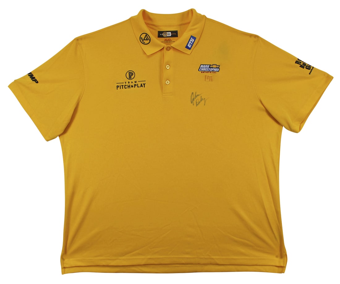 John Daly Signed Match Worn Yellow Polo Shirt BAS Authentication: John Daly Signed Match Worn Yellow Polo Shirt BAS Authentication Celebrate the legacy of golf with this authentic match-worn yellow polo shirt, personally signed by the legendary John Daly. The polo,