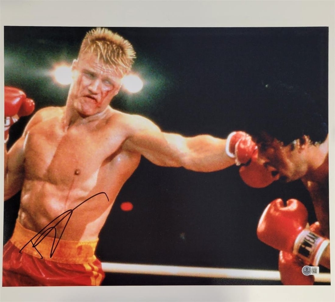 16x20 Dolph Lundgren Ivan Drago Rocky Signed Photo Beckett Authenticated: 16x20 Dolph Lundgren Ivan Drago Rocky Signed Photo Beckett Authenticated This is an original 16x20 photograph signed by Dolph Lundgren as Ivan Drago from Rocky. The autograph is authenticated by Becke