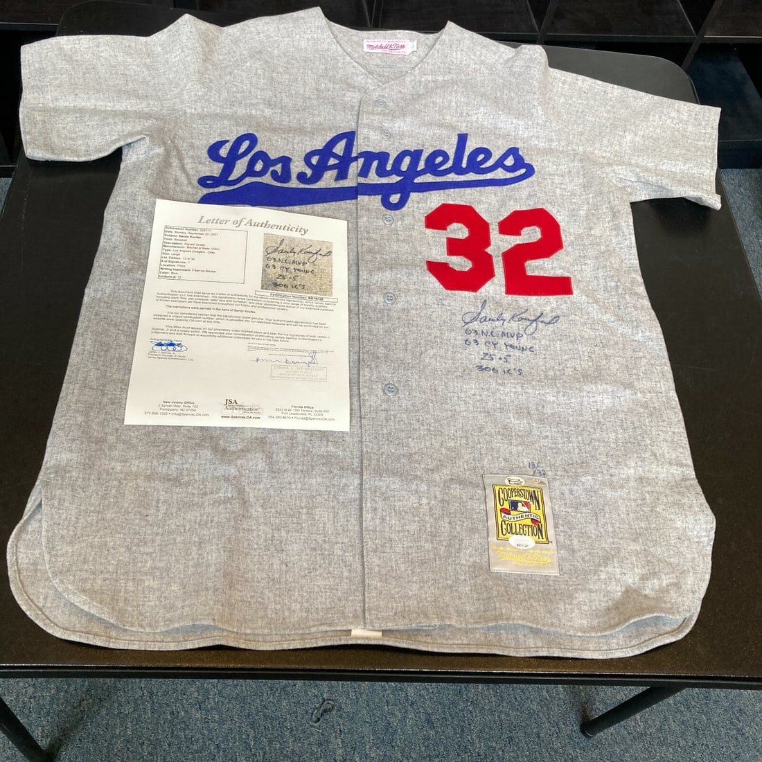 Sandy Koufax Signed Dodgers Jersey with JSA COA and Inscription: Sandy Koufax Signed Dodgers Jersey with JSA COA and Inscription This authentic Mitchell & Ness game model jersey celebrates the legendary Sandy Koufax, featuring his bold blue ink signature along with