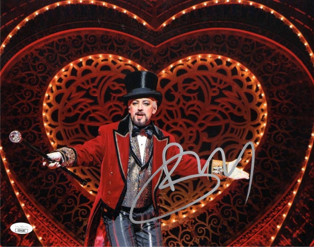 Boy George Autographed 11X14 Photo Culture Club JSA Certified: Boy George Autographed 11X14 Photo Culture Club JSA Certified This is an original 11X14 photograph of Boy George, signed by the artist himself. The photograph is authenticated by James Spence Authenti