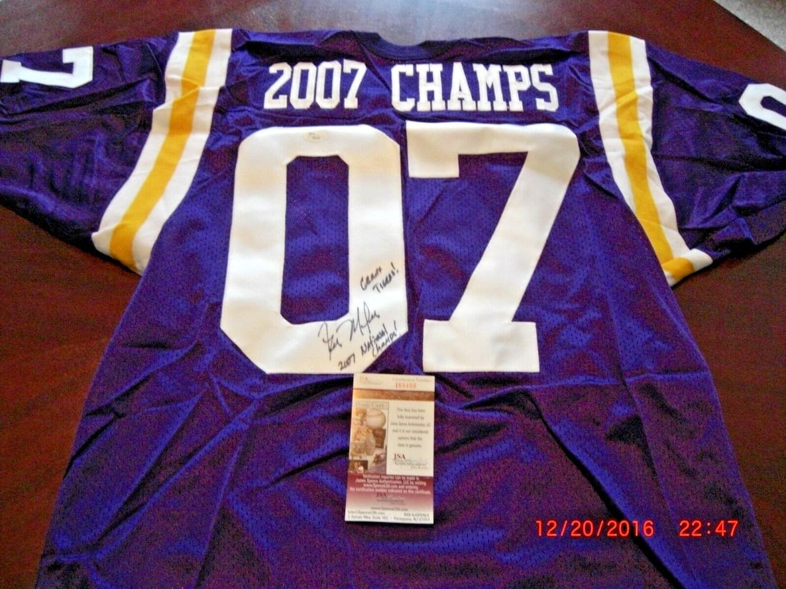 Les Miles Signed LSU Tigers 2007 National Champs Jersey JSA COA: Les Miles Signed LSU Tigers 2007 National Champs Jersey JSA COA Celebrate the LSU Tigers' incredible 2007 National Championship victory with this signed jersey by Les Miles. An authentic piece of foot