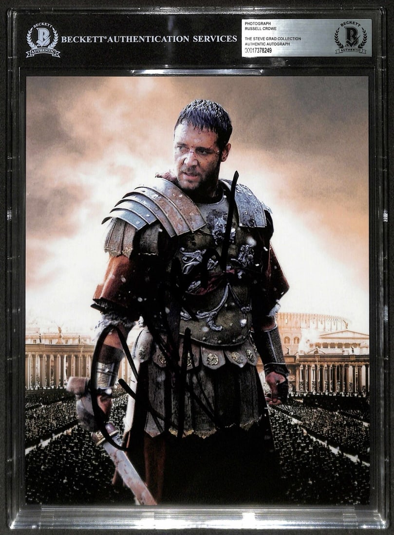 Autographed Gladiator 8x10 Photograph Russell Crowe Beckett Authenticated: Autographed Gladiator 8x10 Photograph Russell Crowe Beckett Authenticated This 8x10 color photograph features Russell Crowe as Maximus from the movie Gladiator, signed in black permanent marker by the