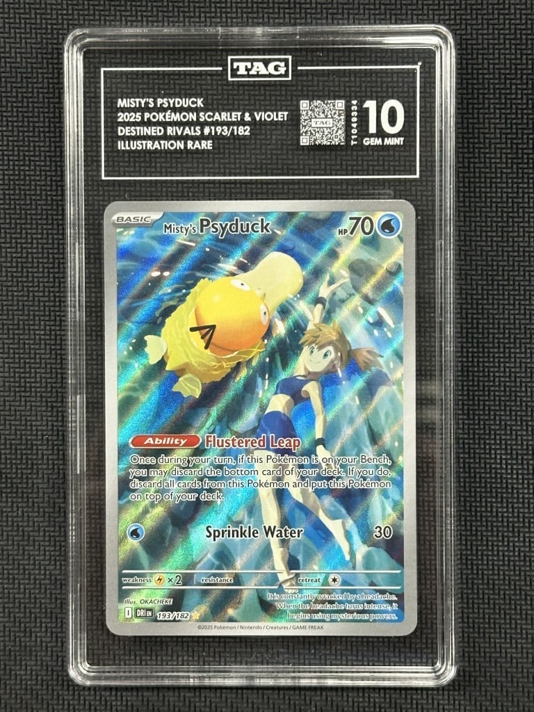 TAG 10 Graded Misty's Psyduck Illustration Rare Destined Rivals Card 193/182: TAG 10 Graded Misty's Psyduck Illustration Rare Destined Rivals Card 193/182 This is a Misty's Psyduck Illustration Rare card from the Destined Rivals set, card number 193/182. The card has been profe