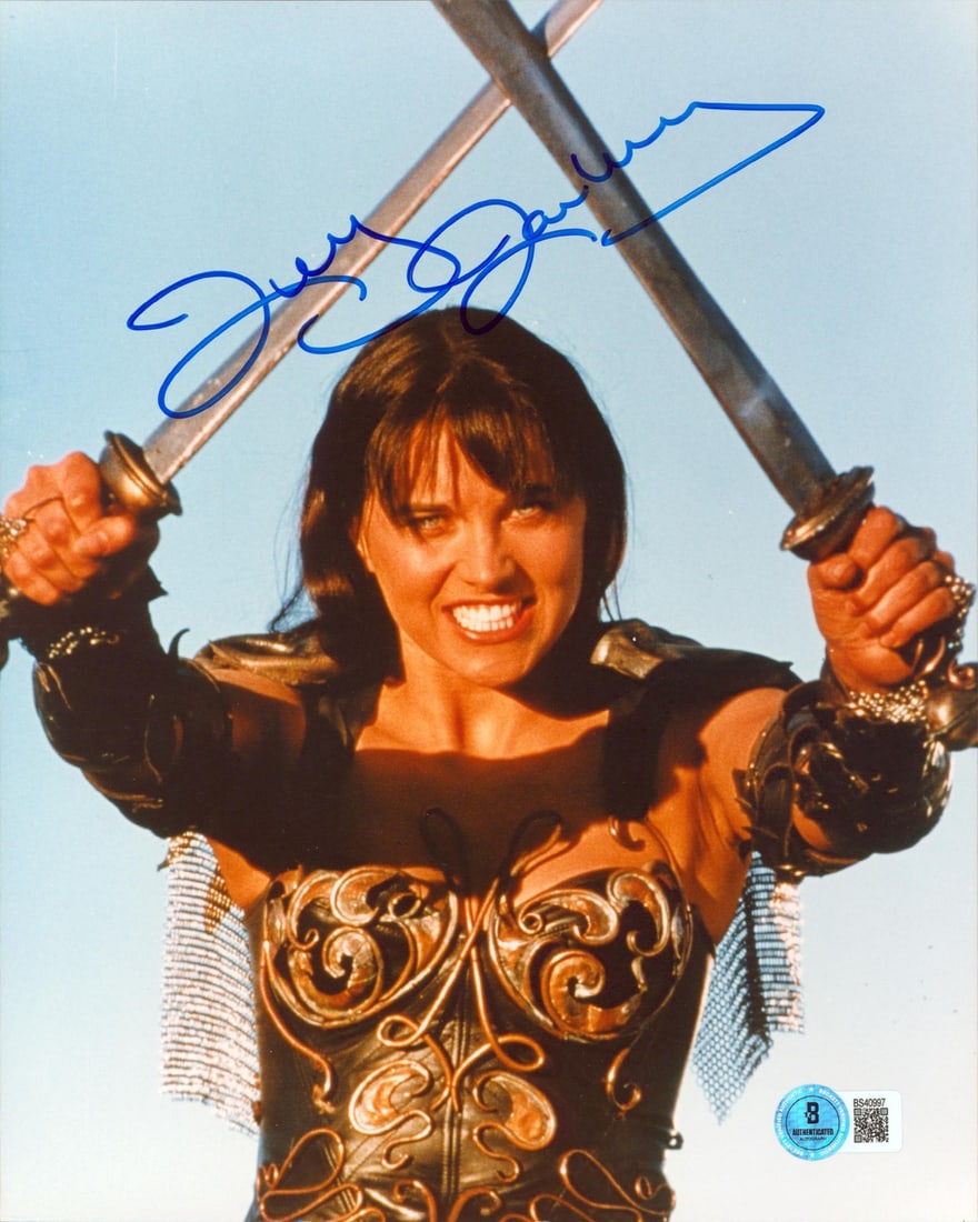 Lucy Lawless Signed Xena Warrior Princess 8x10 Photo Beckett Authenticated: Lucy Lawless Signed Xena Warrior Princess 8x10 Photo Beckett Authenticated This authentic 8x10 photograph features Lucy Lawless, known for her iconic role in Xena: Warrior Princess. Personally signed
