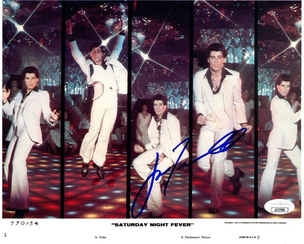 John Travolta Saturday Night Fever Signed 8X10 Photo JSA Authenticated: John Travolta Saturday Night Fever Signed 8X10 Photo JSA Authenticated This is an original 8x10 photograph of John Travolta, famously known for his role in Saturday Night Fever, featuring his authenti
