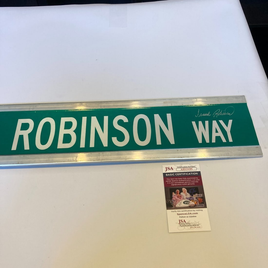 Frank Robinson Autographed 6x30 Street Sign with JSA COA: Frank Robinson Autographed 6x30 Street Sign with JSA COA This is an original, double-sided street sign measuring 6x30 inches, commemorating Frank Robinson Way. The sign features authentic signatures f