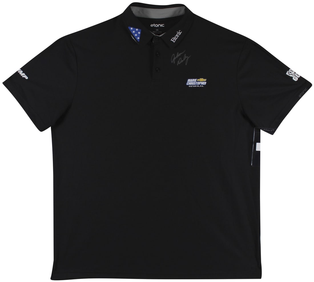 John Daly Signed Match Worn Etonic Polo Shirt Folds of Honor BAS: John Daly Signed Match Worn Etonic Polo Shirt Folds of Honor BAS This is an authentic match-worn black Etonic polo shirt from the Folds of Honor collection, personally signed by professional golfer Jo