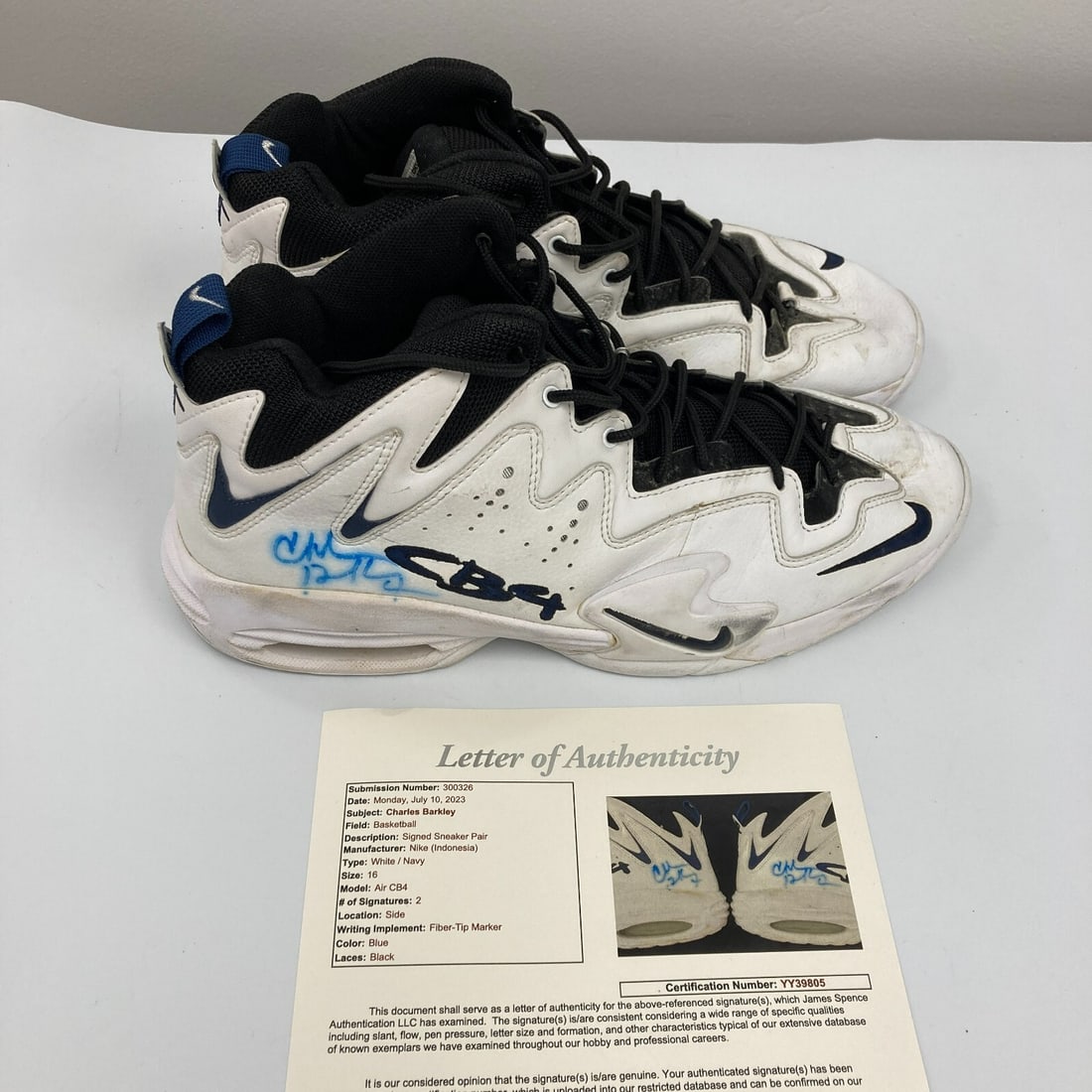 Charles Barkley Signed Game-Used Nike CB4 Sneakers with JSA COA: Charles Barkley Signed Game-Used Nike CB4 Sneakers with JSA COA Step onto the court with a piece of basketball history! These Charles Barkley game-used sneakers, worn during the 1996-2000 NBA seasons,