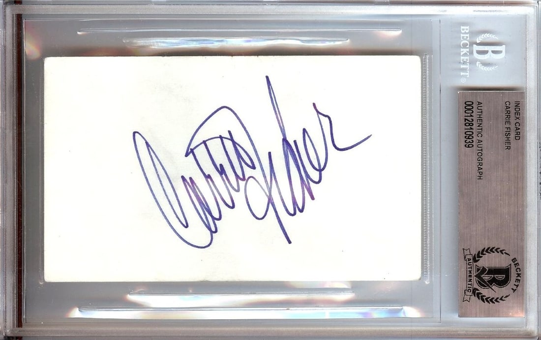 Carrie Fisher Signed Index Card Star Wars Leia Beckett Authenticated: Carrie Fisher Signed Index Card Star Wars Leia Beckett Authenticated This is an autographed 3X5 index card signed by Carrie Fisher, best known for her iconic role as Leia in the Star Wars franchise. T
