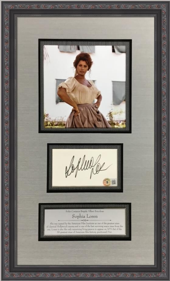 Sophia Loren Signed Cut Display Custom Framed Beckett Authenticated: Sophia Loren Signed Cut Display Custom Framed Beckett Authenticated This custom framed display features a cut signature from the acclaimed Italian actress Sophia Loren, known for her role in 'Grumpier