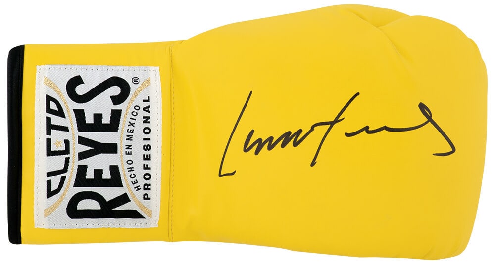 Lennox Lewis Signed Cleto Reyes Yellow Boxing Glove with COA: Lennox Lewis Signed Cleto Reyes Yellow Boxing Glove with COA This authentic Lennox Lewis signed Cleto Reyes yellow boxing glove is a must-have for boxing enthusiasts. With a rich history as a Heavywei
