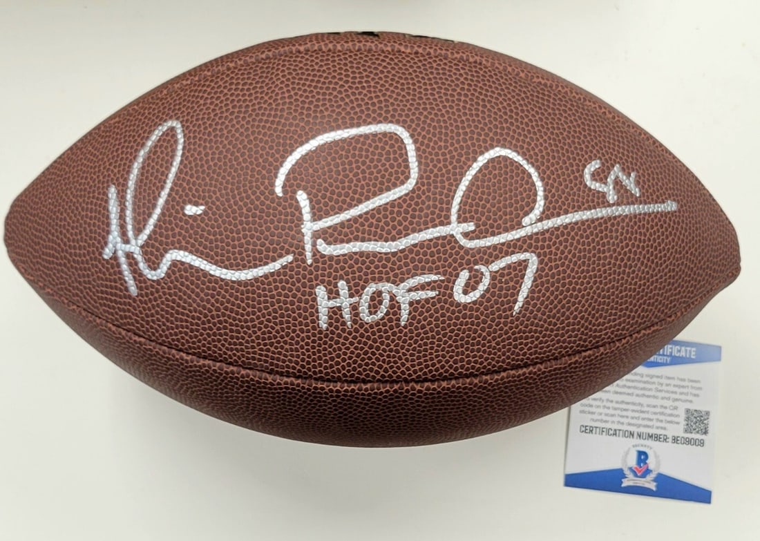 Michael Irvin HOF 07 Signed NFL Football with Beckett COA: Michael Irvin HOF 07 Signed NFL Football with Beckett COA This is an original NFL football signed by Michael Irvin, a Hall of Fame inductee from 2007. The football has been authenticated by Beckett, e