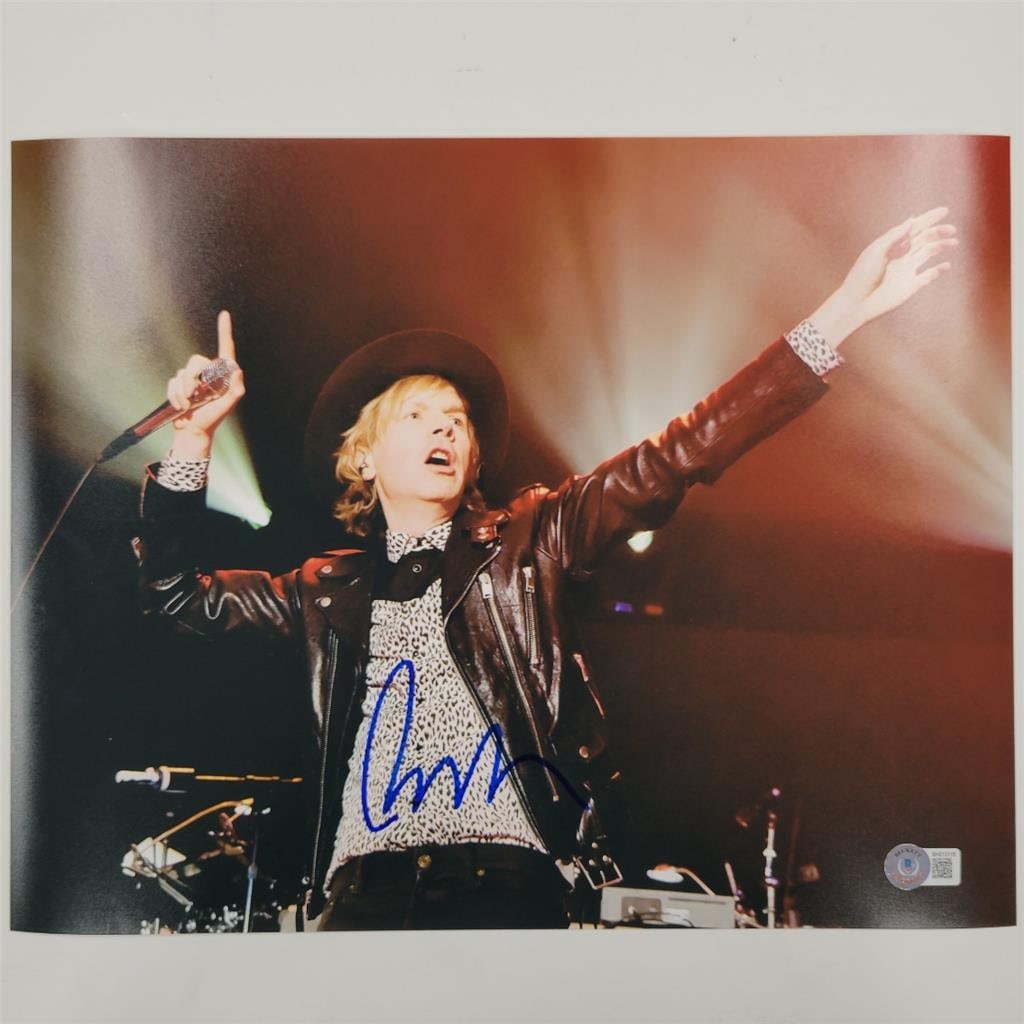 Signed Beck 11x14 Photograph with Beckett Authentication Hologram: Signed Beck 11x14 Photograph with Beckett Authentication Hologram This original 11x14 photo features the autograph of singer and musician Beck Hansen. The signature is authenticated by Beckett and the