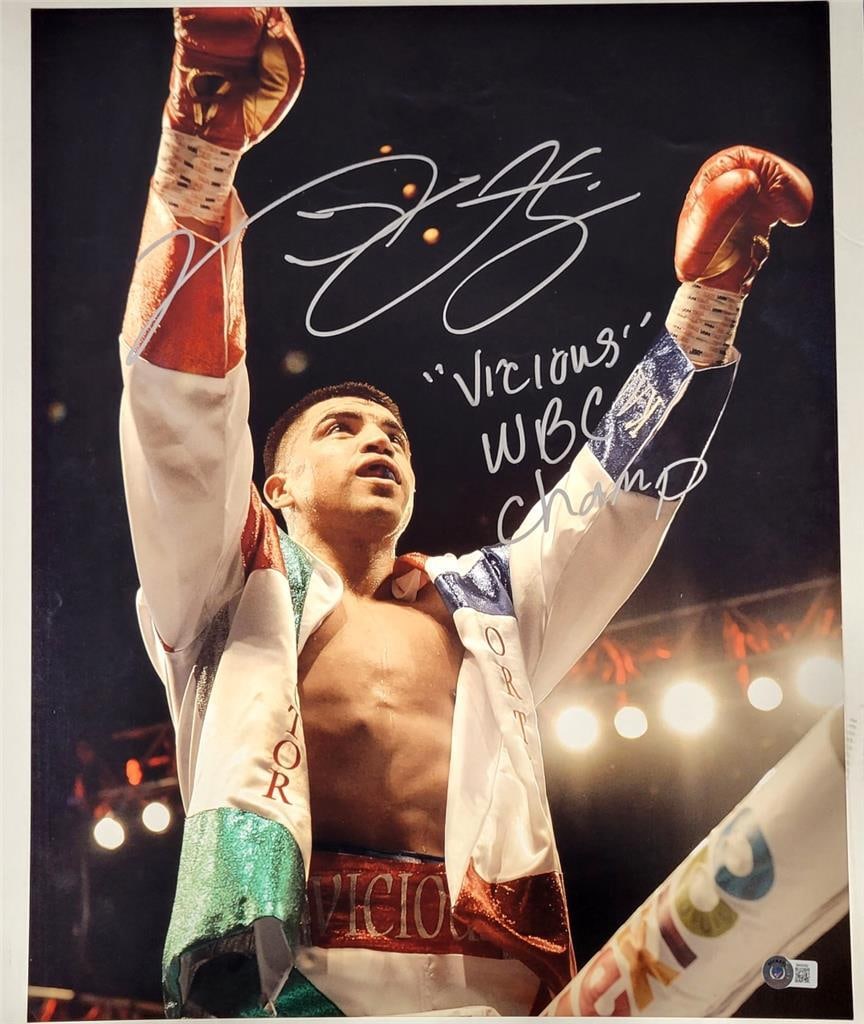 Victor Ortiz Autographed 16x20 Boxing Photo Inscribed Vicious WBC Champ Beckett: Victor Ortiz Autographed 16x20 Boxing Photo Inscribed Vicious WBC Champ Beckett This is an original 16x20 photo signed by Victor Ortiz with the inscription "Vicious, WBC Champ." The autograph is authe