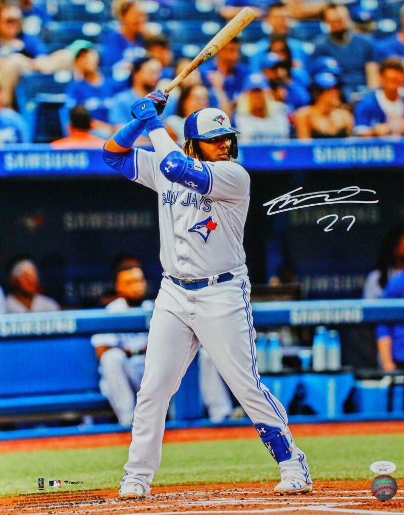 Vladimir Guerrero Jr. Autographed 16x20 Blue Jays Photo JSA Authenticated: Vladimir Guerrero Jr. Autographed 16x20 Blue Jays Photo JSA Authenticated Capture a moment of baseball history with this signed photograph featuring Vladimir Guerrero Jr. in his iconic batting pose wi